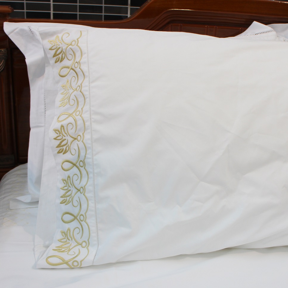 Abstract lotus embroidered pillowcase with hemstitch in gold
